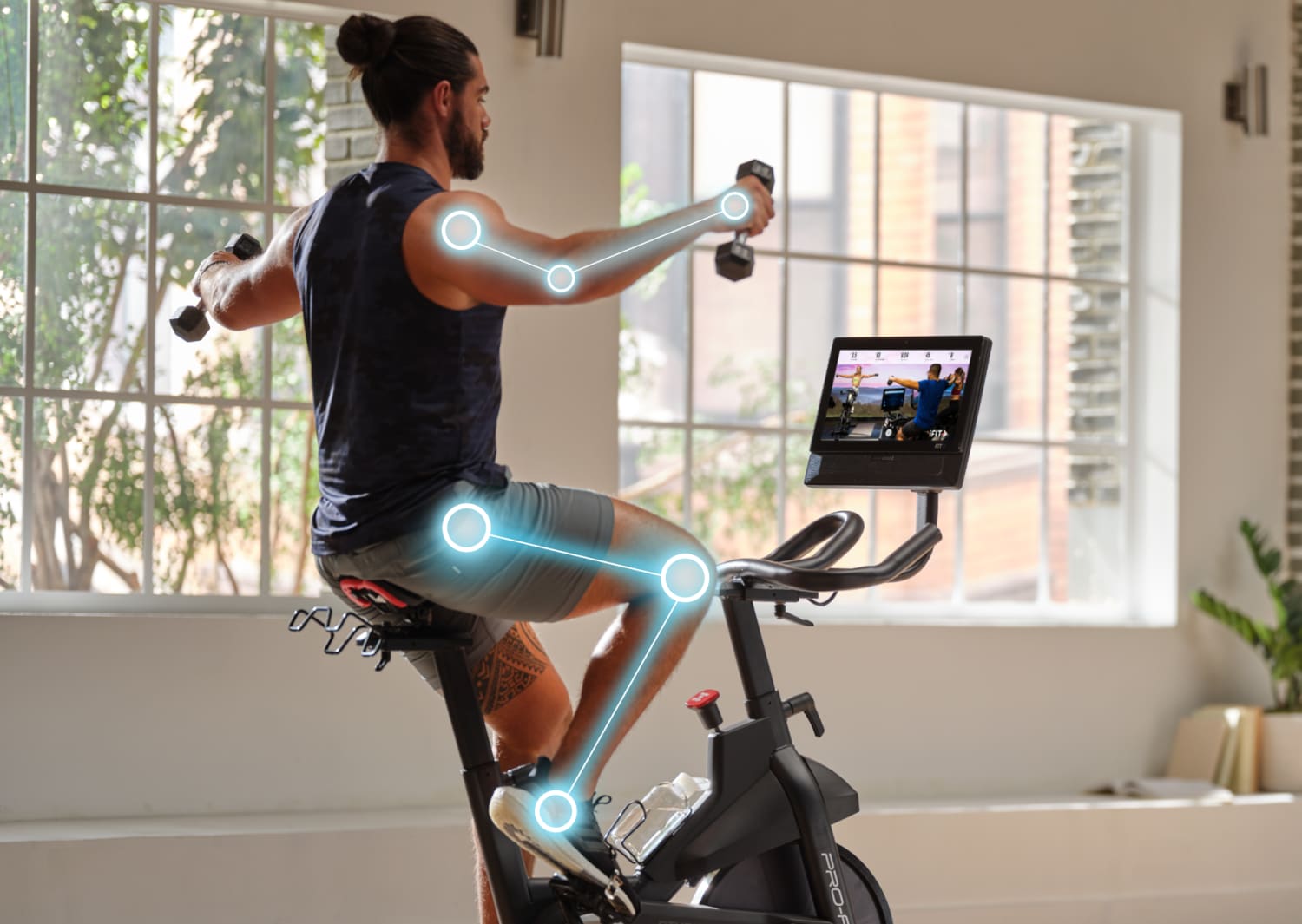 Stationary bike dumbbell holder clearance
