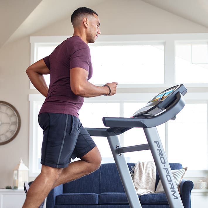 man running on treadmill