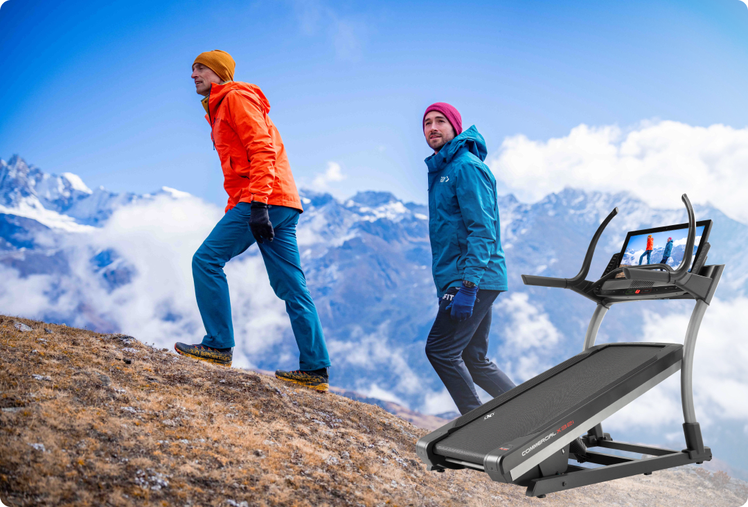iFIT trainer hiking up a mountain